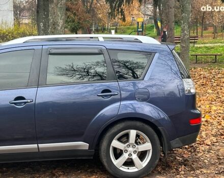Синій Міцубісі Аутлендер, об'ємом двигуна 2.4 л та пробігом 211 тис. км за 8390 $, фото 6 на Automoto.ua