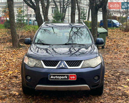 Синій Міцубісі Аутлендер, об'ємом двигуна 2.4 л та пробігом 211 тис. км за 8390 $, фото 1 на Automoto.ua
