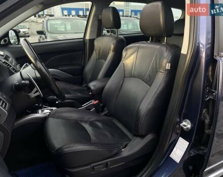 Синій Міцубісі Аутлендер, об'ємом двигуна 2.36 л та пробігом 282 тис. км за 9490 $, фото 23 на Automoto.ua