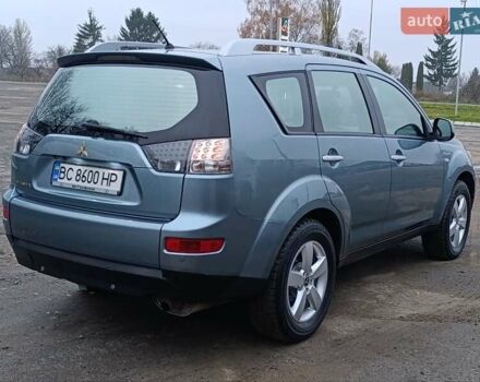 Синий Мицубиси Аутлендер, объемом двигателя 2.4 л и пробегом 264 тыс. км за 7555 $, фото 2 на Automoto.ua