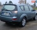 Синий Мицубиси Аутлендер, объемом двигателя 2.4 л и пробегом 264 тыс. км за 7555 $, фото 2 на Automoto.ua