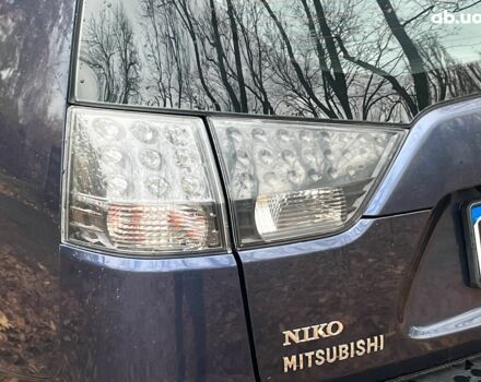 Синій Міцубісі Аутлендер, об'ємом двигуна 2.4 л та пробігом 211 тис. км за 8390 $, фото 11 на Automoto.ua