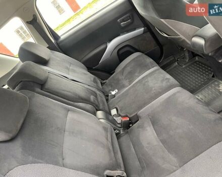 Синий Мицубиси Аутлендер, объемом двигателя 2.4 л и пробегом 94 тыс. км за 8800 $, фото 15 на Automoto.ua