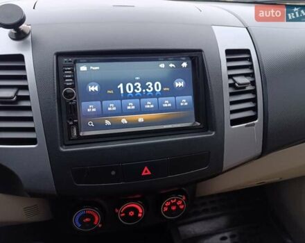 Синий Мицубиси Аутлендер, объемом двигателя 2.4 л и пробегом 264 тыс. км за 7555 $, фото 25 на Automoto.ua