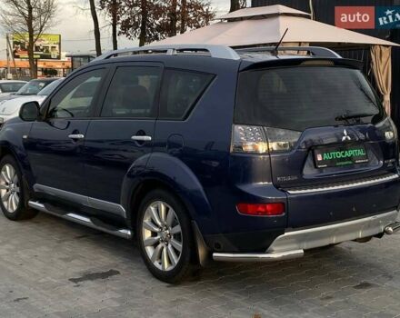 Синій Міцубісі Аутлендер, об'ємом двигуна 2.36 л та пробігом 282 тис. км за 9490 $, фото 13 на Automoto.ua
