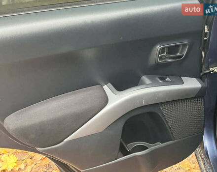 Синій Міцубісі Аутлендер, об'ємом двигуна 2.4 л та пробігом 211 тис. км за 8390 $, фото 26 на Automoto.ua