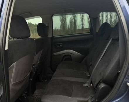 Синий Мицубиси Аутлендер, объемом двигателя 2.4 л и пробегом 211 тыс. км за 7800 $, фото 9 на Automoto.ua