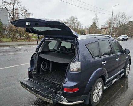 Синій Міцубісі Аутлендер, об'ємом двигуна 2.4 л та пробігом 282 тис. км за 10500 $, фото 2 на Automoto.ua