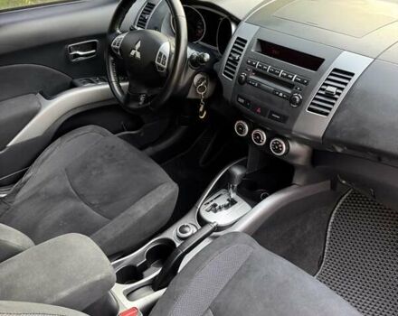 Синий Мицубиси Аутлендер, объемом двигателя 2.36 л и пробегом 223 тыс. км за 8650 $, фото 16 на Automoto.ua