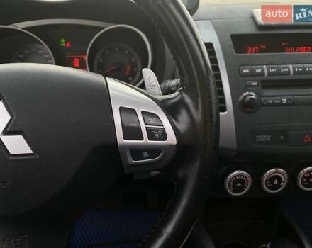 Синій Міцубісі Аутлендер, об'ємом двигуна 2.36 л та пробігом 282 тис. км за 9490 $, фото 30 на Automoto.ua