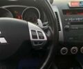 Синій Міцубісі Аутлендер, об'ємом двигуна 2.36 л та пробігом 282 тис. км за 9490 $, фото 30 на Automoto.ua