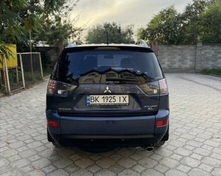 Синий Мицубиси Аутлендер, объемом двигателя 2.36 л и пробегом 223 тыс. км за 8650 $, фото 5 на Automoto.ua