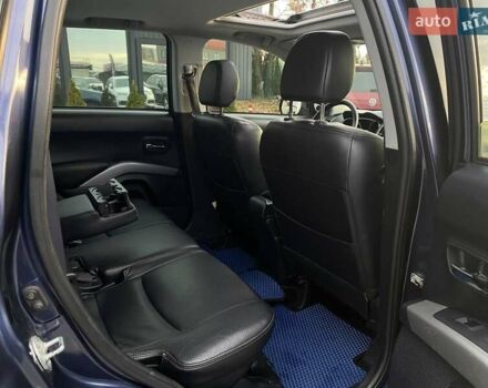 Синій Міцубісі Аутлендер, об'ємом двигуна 2.36 л та пробігом 282 тис. км за 9490 $, фото 26 на Automoto.ua