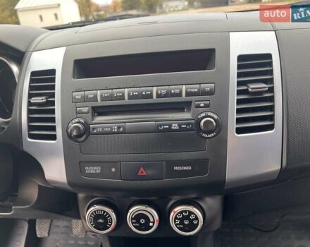 Синий Мицубиси Аутлендер, объемом двигателя 2.4 л и пробегом 94 тыс. км за 8800 $, фото 9 на Automoto.ua