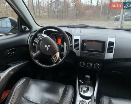 Синий Мицубиси Аутлендер, объемом двигателя 3 л и пробегом 383 тыс. км за 9000 $, фото 11 на Automoto.ua