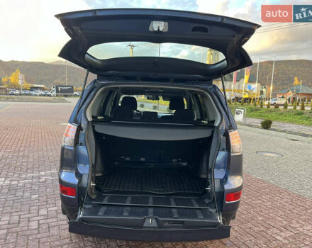 Міцубісі Аутлендер 2008 у Хусте на Automoto.ua Синій Міцубісі Аутлендер, об'ємом двигуна 2.4 л та пробігом 246 тис. км за 7950 $, фото 12 на Automoto.ua