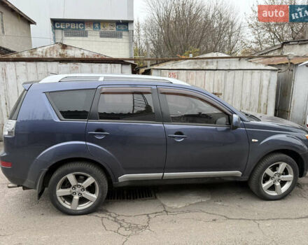 Синий Мицубиси Аутлендер, объемом двигателя 2.36 л и пробегом 269 тыс. км за 7500 $, фото 2 на Automoto.ua