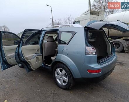 Синий Мицубиси Аутлендер, объемом двигателя 2.4 л и пробегом 264 тыс. км за 7555 $, фото 13 на Automoto.ua