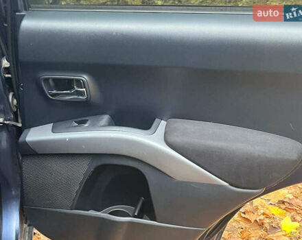 Синій Міцубісі Аутлендер, об'ємом двигуна 2.4 л та пробігом 211 тис. км за 8390 $, фото 22 на Automoto.ua