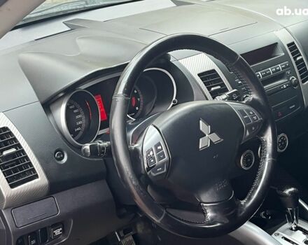 Синій Міцубісі Аутлендер, об'ємом двигуна 2.4 л та пробігом 211 тис. км за 8390 $, фото 29 на Automoto.ua