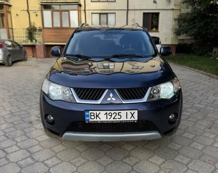 Синий Мицубиси Аутлендер, объемом двигателя 2.36 л и пробегом 223 тыс. км за 8650 $, фото 2 на Automoto.ua
