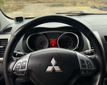 Синий Мицубиси Аутлендер, объемом двигателя 2.4 л и пробегом 211 тыс. км за 7800 $, фото 17 на Automoto.ua