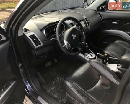 Синий Мицубиси Аутлендер, объемом двигателя 3 л и пробегом 340 тыс. км за 9555 $, фото 11 на Automoto.ua