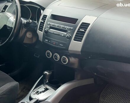 Синій Міцубісі Аутлендер, об'ємом двигуна 2.4 л та пробігом 211 тис. км за 8390 $, фото 16 на Automoto.ua