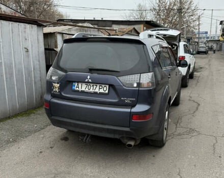 Синий Мицубиси Аутлендер, объемом двигателя 2.36 л и пробегом 269 тыс. км за 7500 $, фото 1 на Automoto.ua