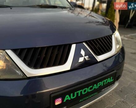 Синій Міцубісі Аутлендер, об'ємом двигуна 2.36 л та пробігом 282 тис. км за 9490 $, фото 6 на Automoto.ua