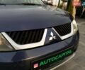 Синій Міцубісі Аутлендер, об'ємом двигуна 2.36 л та пробігом 282 тис. км за 9490 $, фото 6 на Automoto.ua