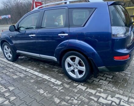 Синий Мицубиси Аутлендер, объемом двигателя 3 л и пробегом 228 тыс. км за 9000 $, фото 3 на Automoto.ua