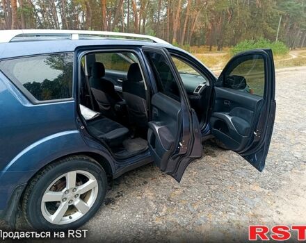 Синій Міцубісі Аутлендер, об'ємом двигуна 2.4 л та пробігом 210 тис. км за 8100 $, фото 2 на Automoto.ua