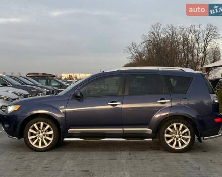 Синій Міцубісі Аутлендер, об'ємом двигуна 2.36 л та пробігом 282 тис. км за 9490 $, фото 16 на Automoto.ua