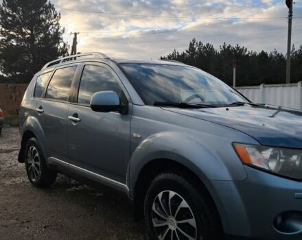 Синий Мицубиси Аутлендер, объемом двигателя 2 л и пробегом 600 тыс. км за 3500 $, фото 4 на Automoto.ua