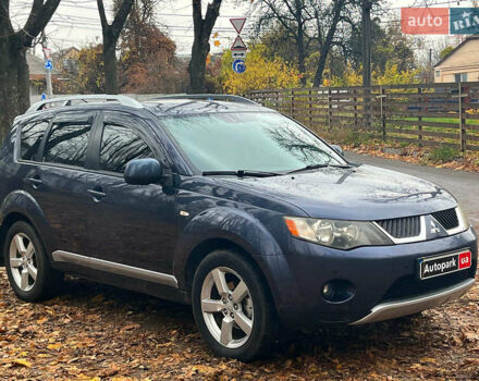 Синій Міцубісі Аутлендер, об'ємом двигуна 2.4 л та пробігом 211 тис. км за 8390 $, фото 3 на Automoto.ua