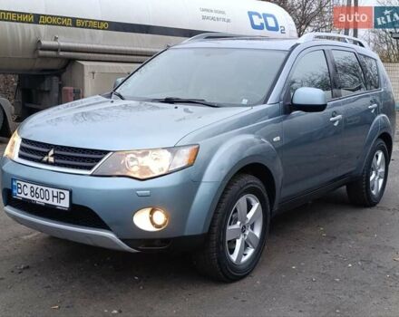 Синий Мицубиси Аутлендер, объемом двигателя 2.4 л и пробегом 264 тыс. км за 7555 $, фото 3 на Automoto.ua