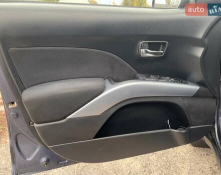 Синий Мицубиси Аутлендер, объемом двигателя 2.4 л и пробегом 94 тыс. км за 8800 $, фото 12 на Automoto.ua