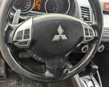 Синий Мицубиси Аутлендер, объемом двигателя 3 л и пробегом 382 тыс. км за 8200 $, фото 16 на Automoto.ua