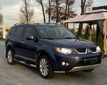 Синий Мицубиси Аутлендер, объемом двигателя 2.4 л и пробегом 282 тыс. км за 9490 $, фото 2 на Automoto.ua