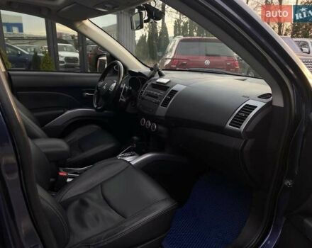 Синій Міцубісі Аутлендер, об'ємом двигуна 2.36 л та пробігом 282 тис. км за 9490 $, фото 22 на Automoto.ua