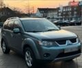 Синий Мицубиси Аутлендер, объемом двигателя 2.4 л и пробегом 207 тыс. км за 7800 $, фото 1 на Automoto.ua