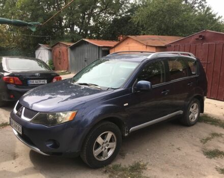 Синій Міцубісі Аутлендер, об'ємом двигуна 2.4 л та пробігом 289 тис. км за 6666 $, фото 1 на Automoto.ua