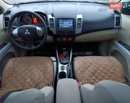 Синий Мицубиси Аутлендер, объемом двигателя 2.4 л и пробегом 264 тыс. км за 7555 $, фото 28 на Automoto.ua