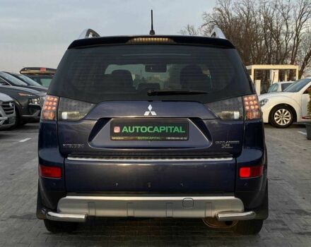 Синий Мицубиси Аутлендер, объемом двигателя 2.4 л и пробегом 282 тыс. км за 9490 $, фото 3 на Automoto.ua