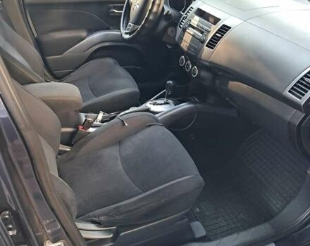 Синий Мицубиси Аутлендер, объемом двигателя 2.4 л и пробегом 160 тыс. км за 8800 $, фото 2 на Automoto.ua