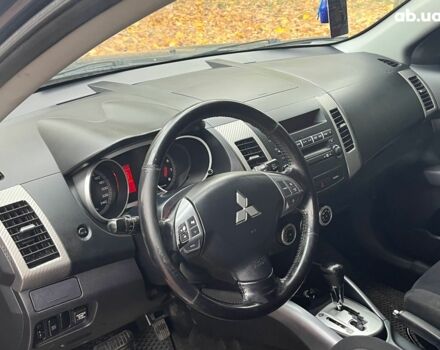 Синій Міцубісі Аутлендер, об'ємом двигуна 2.4 л та пробігом 211 тис. км за 8390 $, фото 28 на Automoto.ua