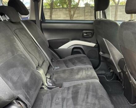 Синий Мицубиси Аутлендер, объемом двигателя 2.36 л и пробегом 223 тыс. км за 8650 $, фото 13 на Automoto.ua