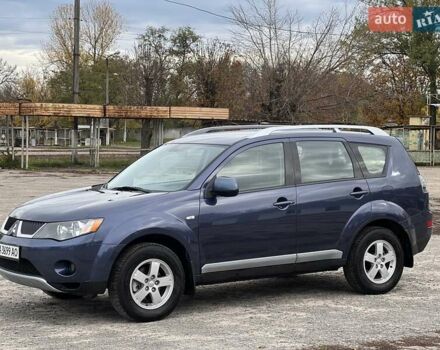 Синий Мицубиси Аутлендер, объемом двигателя 2.4 л и пробегом 94 тыс. км за 8800 $, фото 4 на Automoto.ua