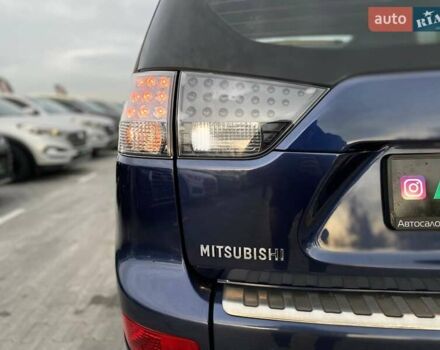 Синій Міцубісі Аутлендер, об'ємом двигуна 2.36 л та пробігом 282 тис. км за 9490 $, фото 14 на Automoto.ua